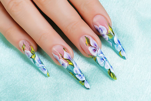 istock Female hand with manicure  and beautiful design on  nails. 520866467