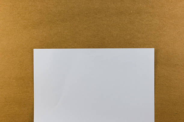 istock blank paper on wood paper background texture vintage 520880248
