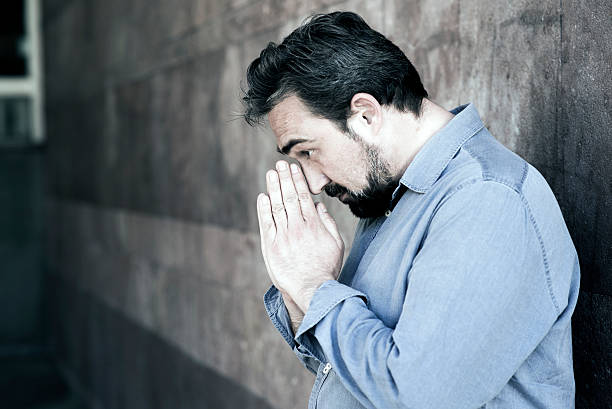 istock Worried Sincere Prayer 520881626