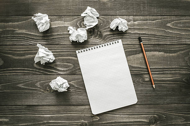 istock Notepad, pencil, crumpled paper on office desk, business creative concept 520882884