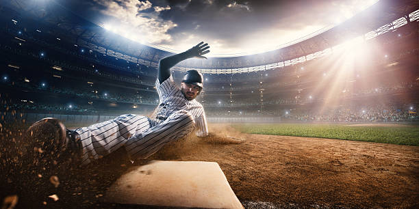 スライドオン 3 ベース - baseball baseball player base sliding ストックフォトと画像