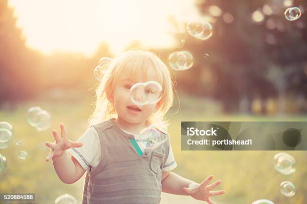 Little Boy And Soap Bubbles Stock Photo - Download Image Now - Playful,  Playing, Summer - iStock
