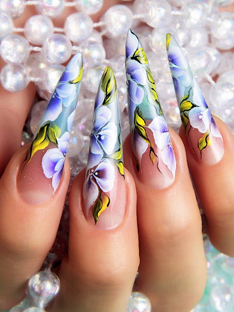 istock Female hand with manicure  and beautiful design on  nails. 520884661