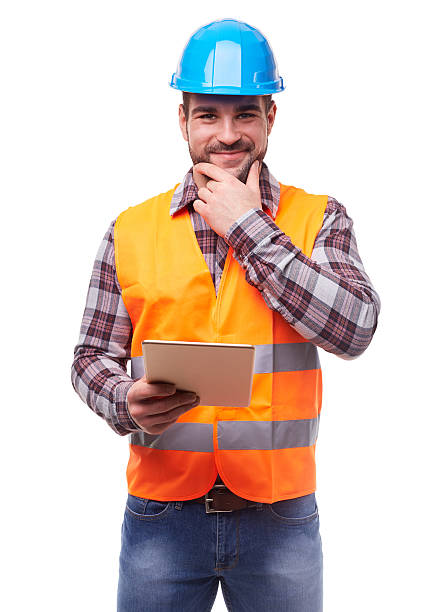 trabalhador manual no capacete com tablet digital azul - building contractor engineer digital tablet construction imagens e fotografias de stock