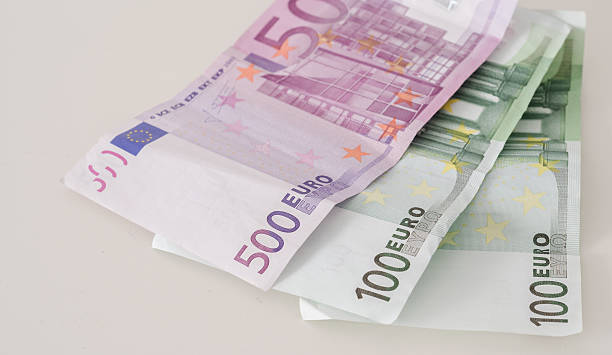 istock Five Hundred and Hundred Euro Banknotes Closeup 520885618
