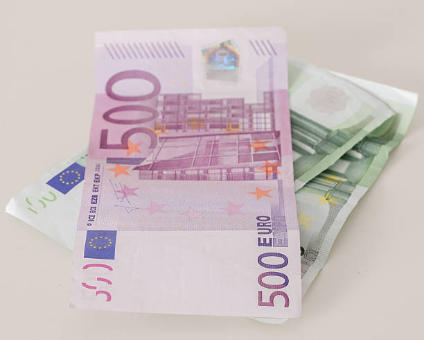 istock Five Hundred and Hundred Euro Banknotes Closeup 520885704
