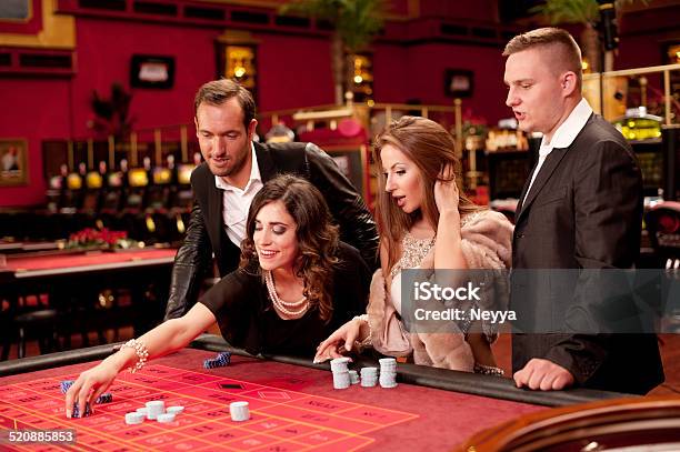 American Roulette Game At Casino Stock Photo - Download Image Now - Casino, Formalwear, People