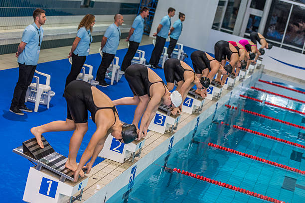 istock Female swimmer on starting block 520886332
