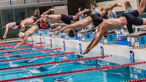 istock Male swimmer jumping 520886538