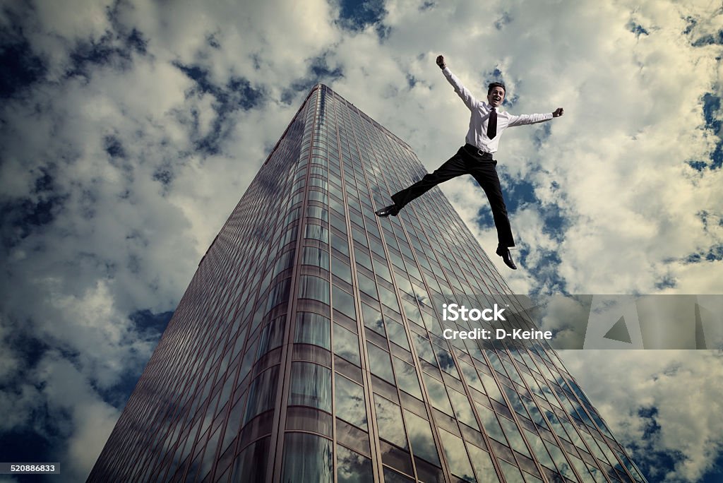 Suicide Businessman jumping from skyscraper. Suicide concept. Failure Stock Photo