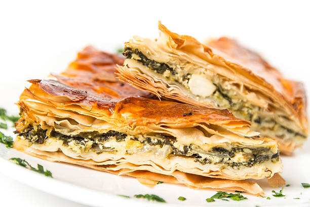 Spanakopita (greek spinach pie) Spanakopita is a Greek pastry filled with spinach and cheese spanakopita stock pictures, royalty-free photos & images