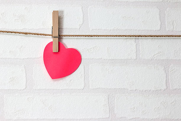 istock blank red heart over brick wallpaper, valentines background 520888144