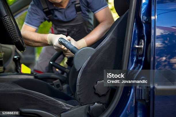 Cleaning Of Interior Of The Car With Vacuum Cleaner Stock Photo - Download Image Now