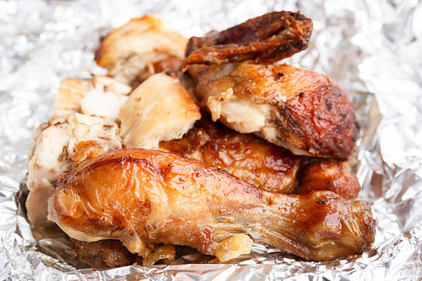 Closeup grilled chicken on Aluminium foil