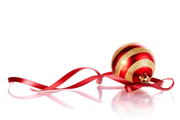 istock Striped New Year's ball with a red tape. 520888903