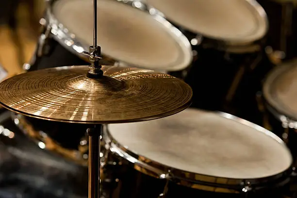Detail of a drum kit closeup in dark colors