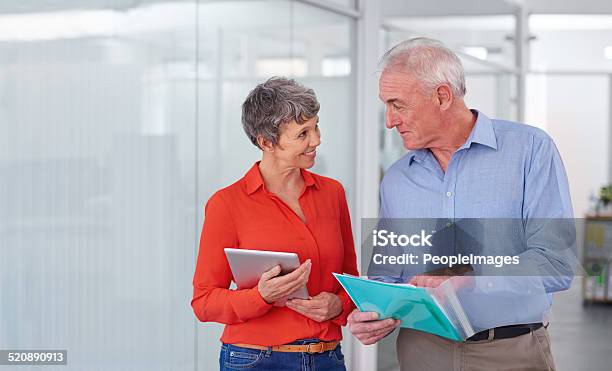 Discussing Their Strategy On The Next Project Stock Photo - Download Image Now - Adult, Adults Only, Beautiful People