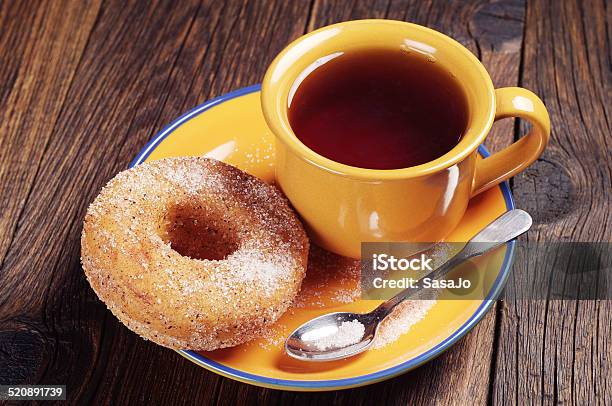 Donut With Sugar And Tea Stock Photo - Download Image Now - Baked, Baked Pastry Item, Bakery