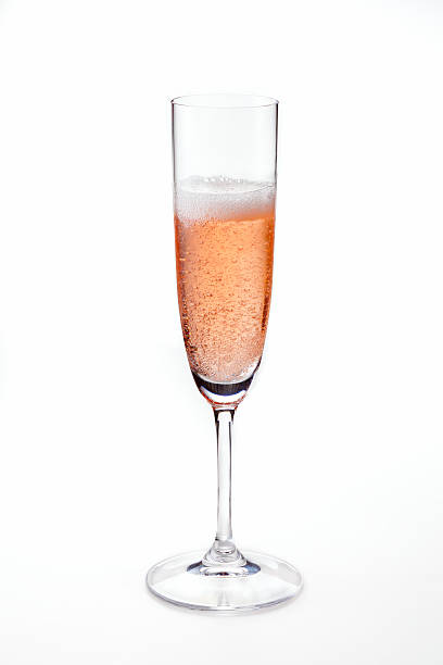 vin rosé pétillant - champagne pouring champagne flute glass photos et images de collection