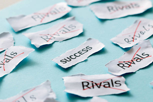 istock defeat business competitor and success concept 520910203