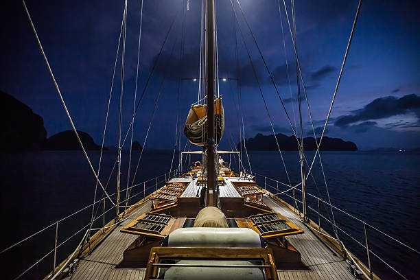 istock Nautical Scene Sailing Boat at Night 520911179