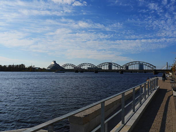 istock railroad bridge and National Library in Riga 520912589