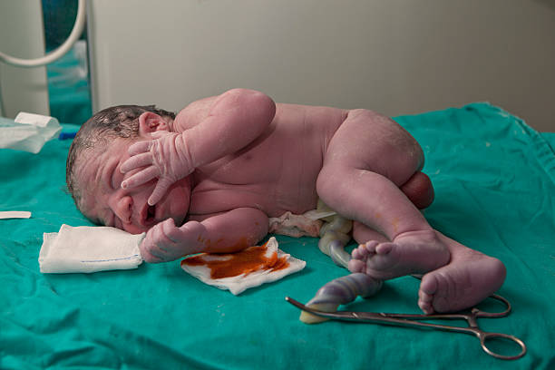 istock newborn first medical exam 520913183