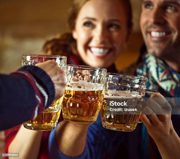 Friends Toasting With Beer Stock Photo - Download Image Now - Apres-Ski, Alcohol - Drink, Party - Social Event