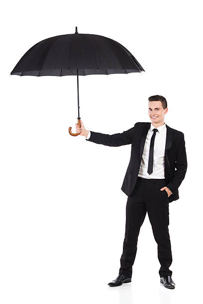 istock Insurance agent holding an umbrella 520915987