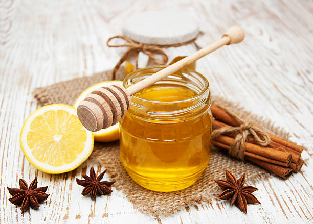 istock fresh honey with  spices and lemon 520917749