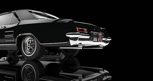 istock Old car - tail shot - on black reflective background 520935390