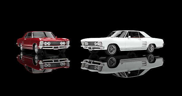 istock Red and white classic cars - on black reflective background 520935472