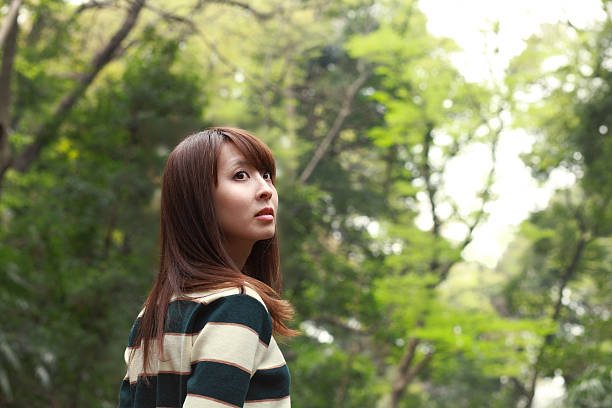 istock woman in nature 520936388