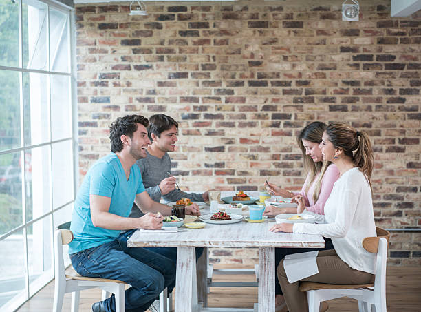 istock Friends eating lunch at a restaurant 520937806
