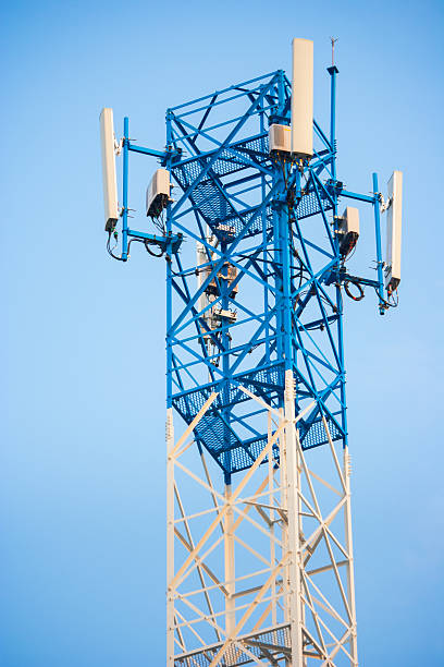 istock Close up antenna for mobile communication in clear blue sky. 520939584