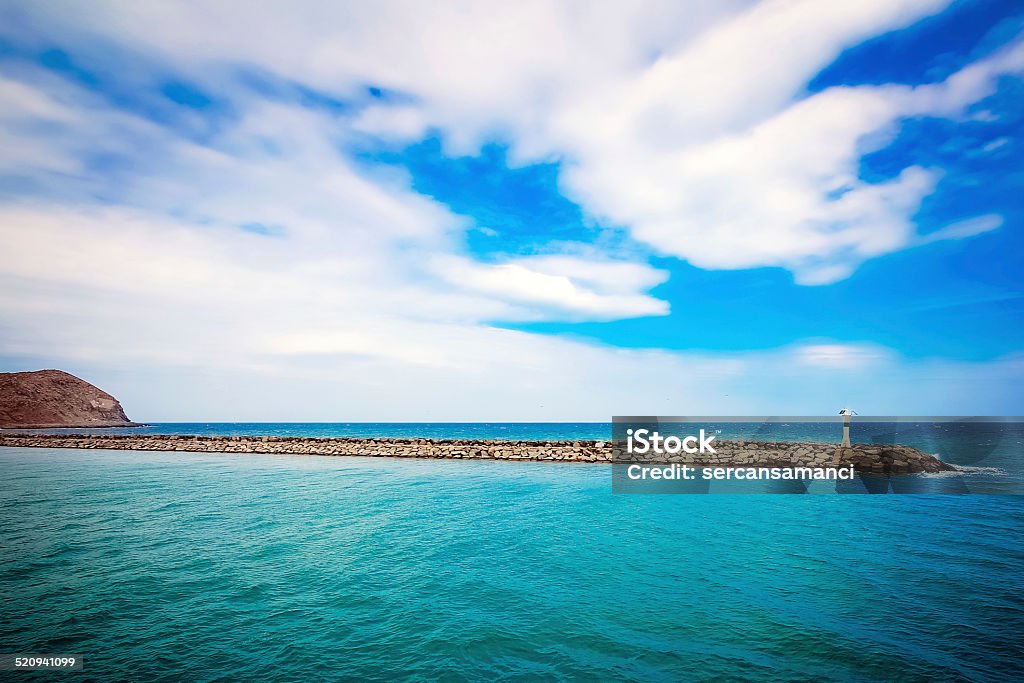 Lighthouse and Waves Sea Stock Photo