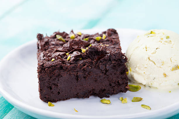istock Chocolate brownie, cake on a white plate 520942838