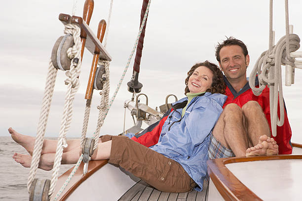 istock Couple on a sailboat 520943760