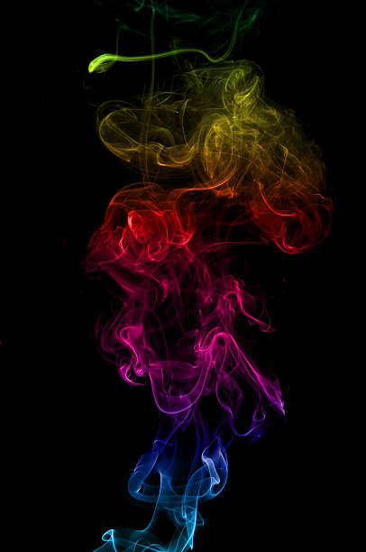 istock Colorful smoke on the black background 520943820