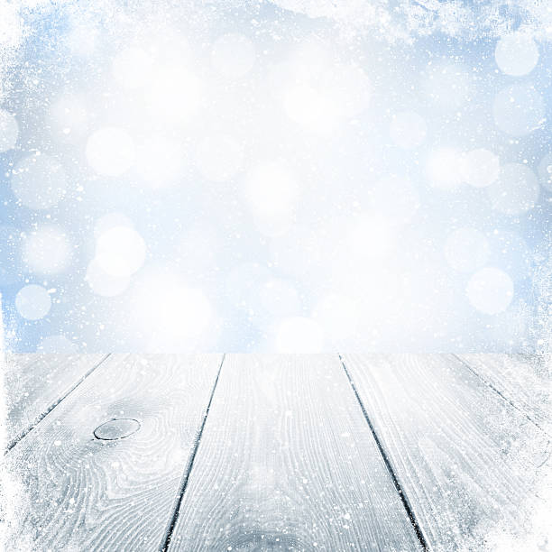 istock Christmas winter background with snow and wooden table 520946265