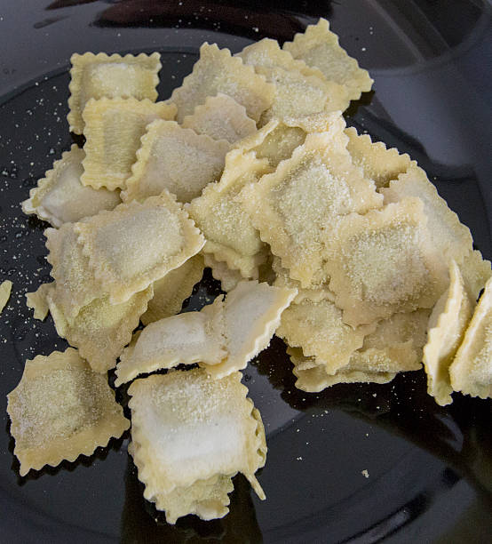 istock Spinach and ricotta filled ravioli 520946386