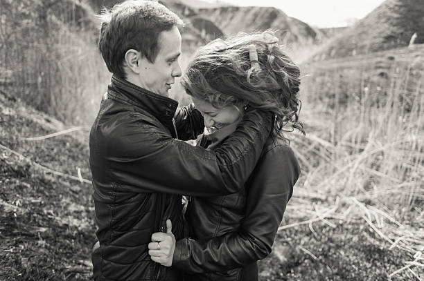 istock Happy couple smiling outdoors in the mountains 520946874