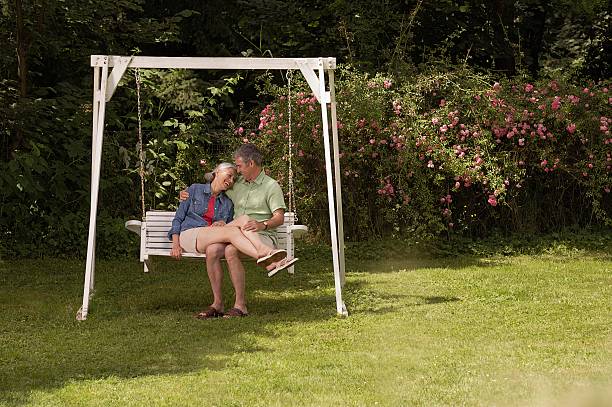 Happy couple on swing