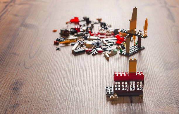 Antalya,Turkey - March 25, 2016: lego home building ,children's constructor toys eco farm lego , on wood  table. There are some Lego bricks on the table ,shooting at school.