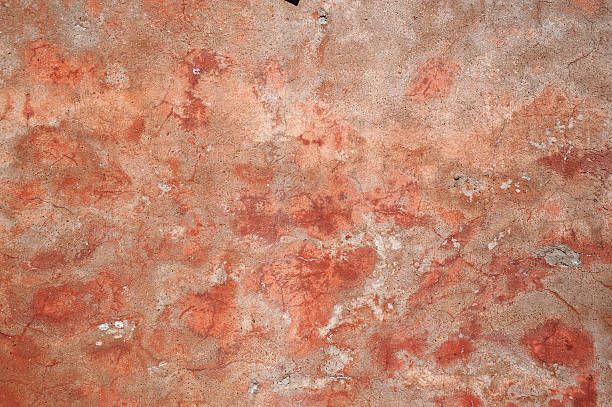 istock Texture of old wall covered with pink stucco 520960457