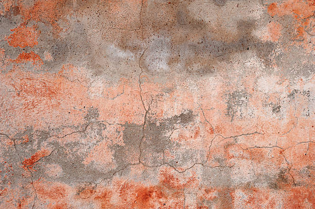 istock Texture of old rustic wall covered with pink stucco 520960461