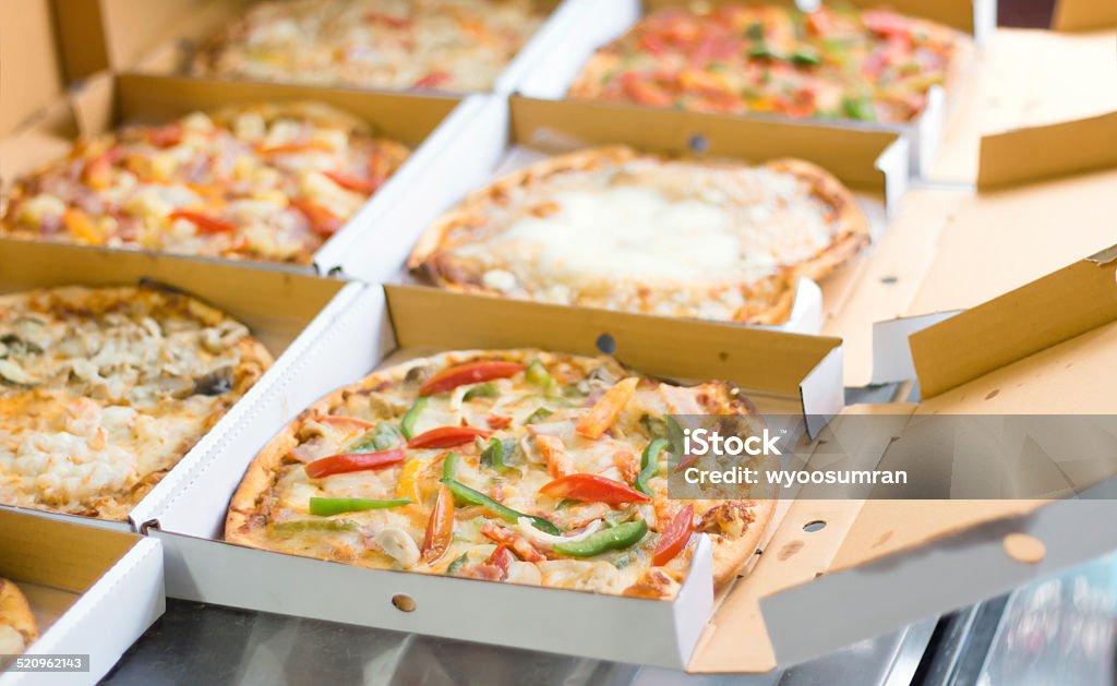 Pizza in box Pizza in box at the kitchen Baked Stock Photo