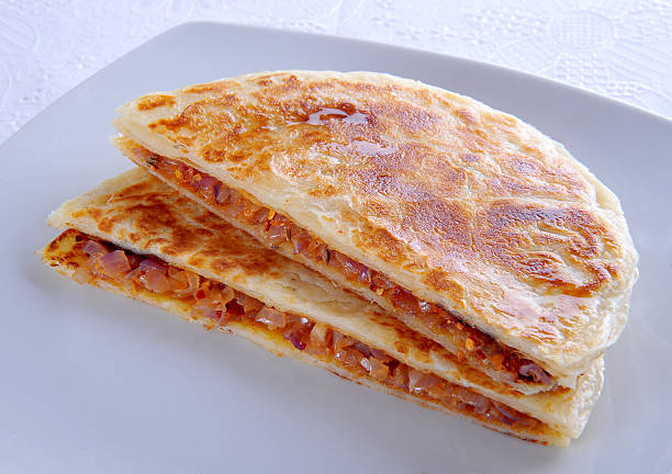 Onion Paratha Slice-2 Delicious onion paratha slices taftan stock pictures, royalty-free photos & images