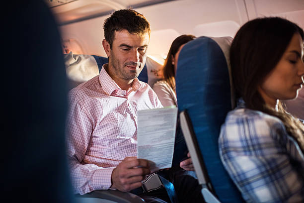 istock Man traveling by airplane. 520964819