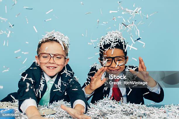 Young Businessmen Partying With Shredded Paper Stock Photo - Download Image Now - Child, Paper, Shredded